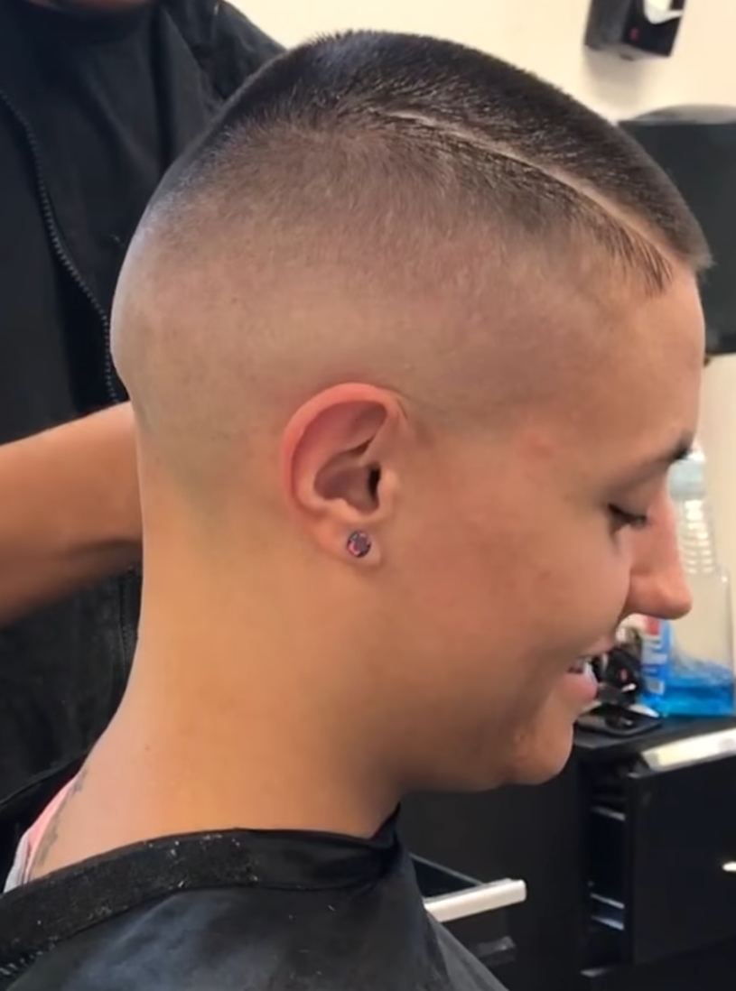 buzzed back with short fizzy hairstyle - wavy haircut