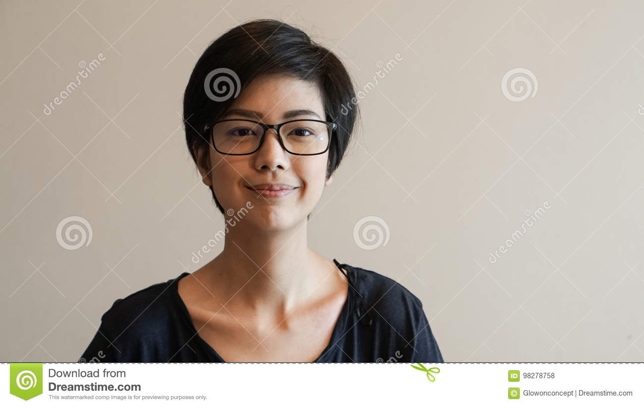 Asian Woman With Short Hair And Glasses On Color Background Stock throughout Asian Hairstyle With Glasses