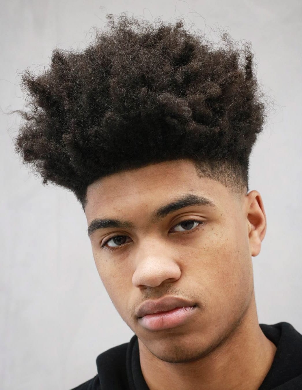 Afro With Undercut Man Wavy Haircut