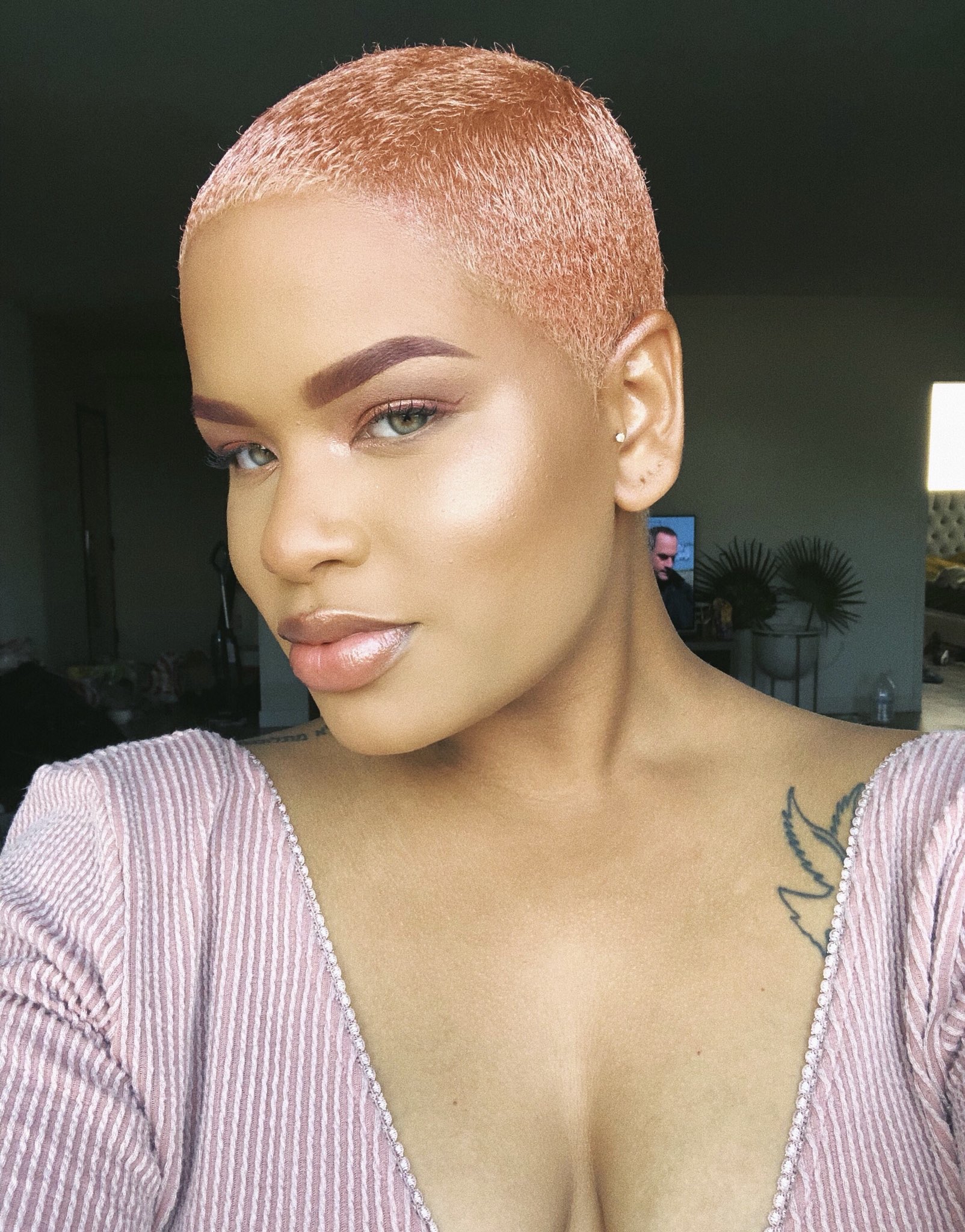 Of African Descent + Pink Dyed Hair + Light Eyes with Gay Hairstyles For Women In Chicago